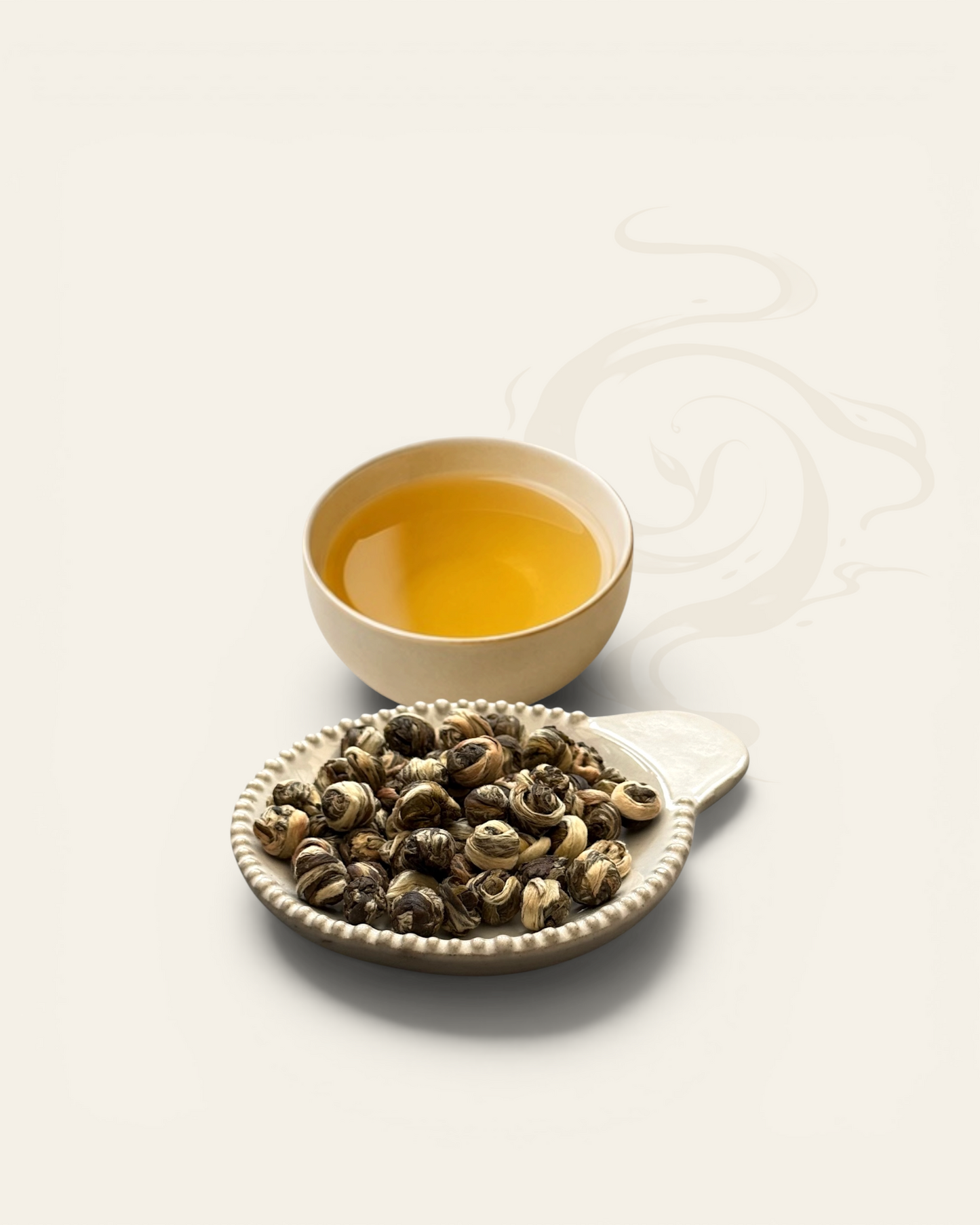Jasmine Pearl green tea — hand-rolled pearls scented with fresh jasmine blossom