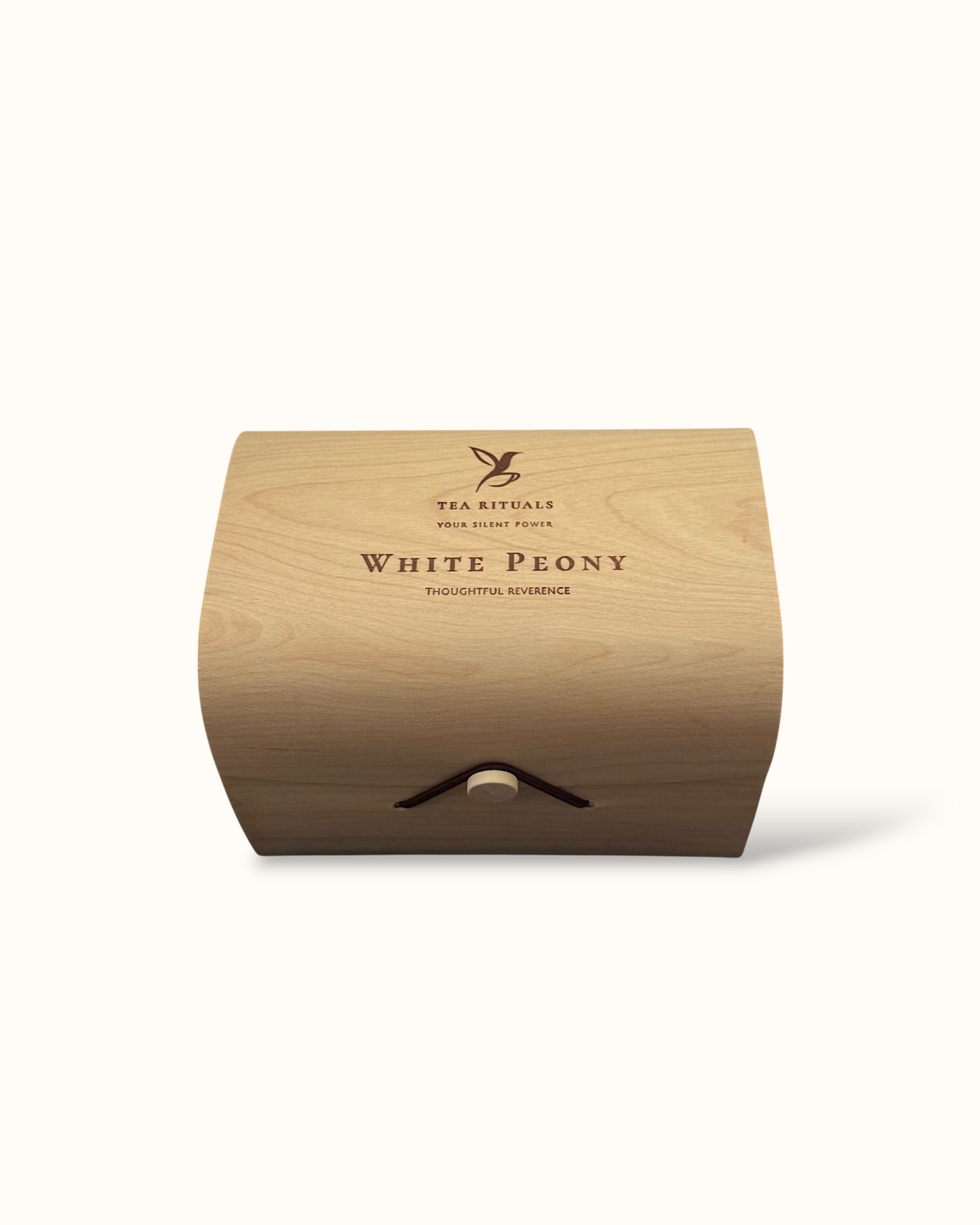 White Peony white tea birch wood tea box on a light background
