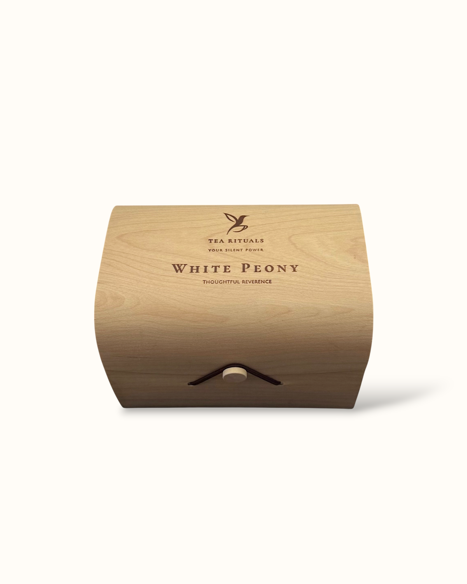 White Peony white tea birch wood tea box on a light background
