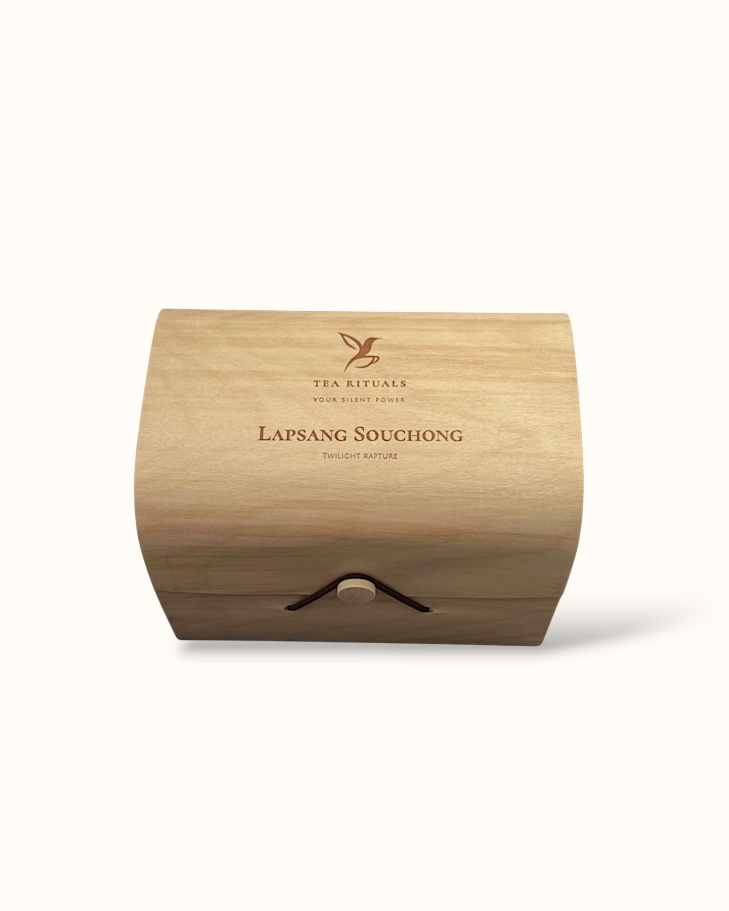 Lapsang Souchong black tea birch wood tea box on a light background
