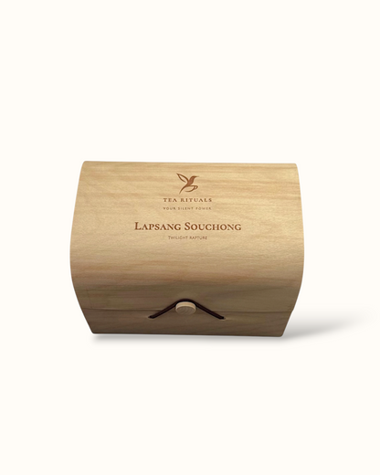 Lapsang Souchong black tea birch wood tea box on a light background
